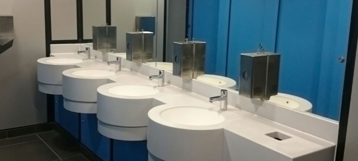 4 basin vanity unit with hard surface top and basins manufactured by Aspen Concepts