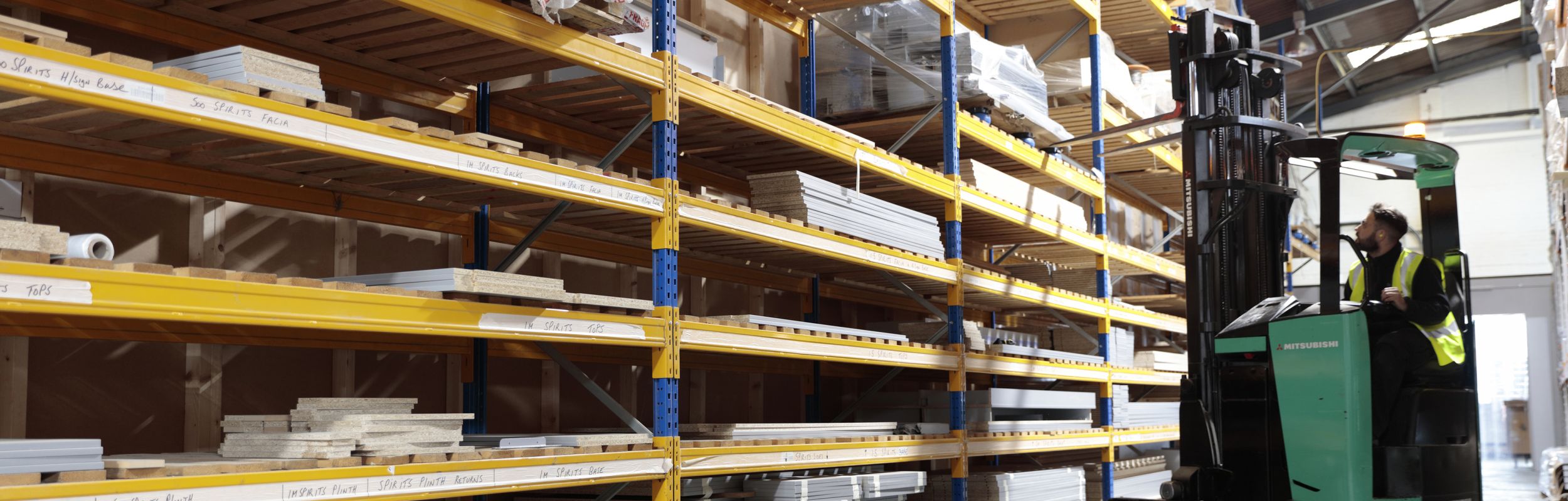 warehouse in Aspen Concepts factory with forklift truck