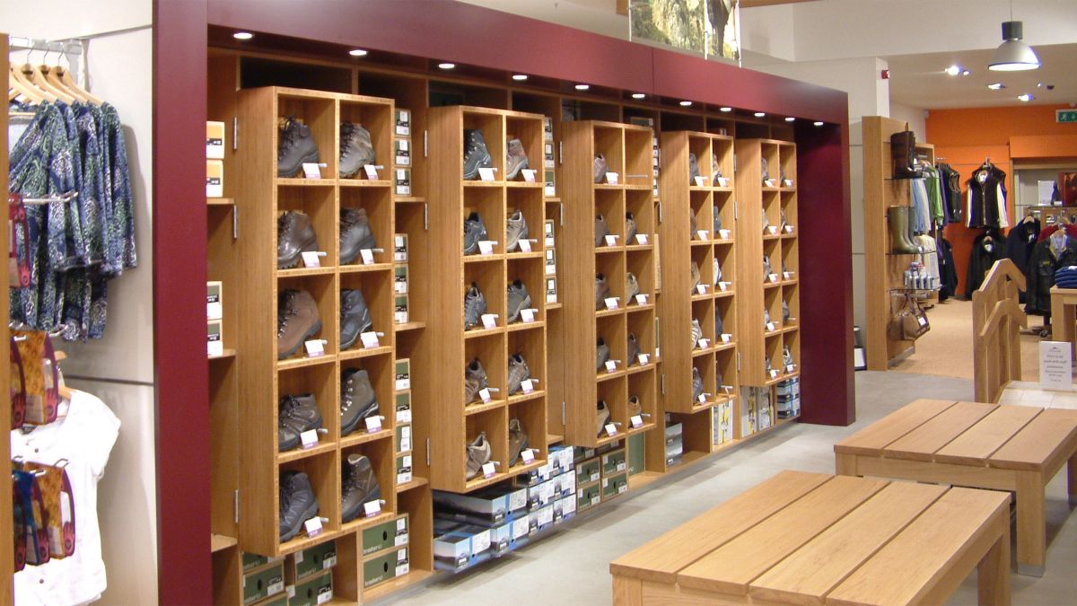 walking shop boot display wooden pigeon holes made by Aspen Concepts