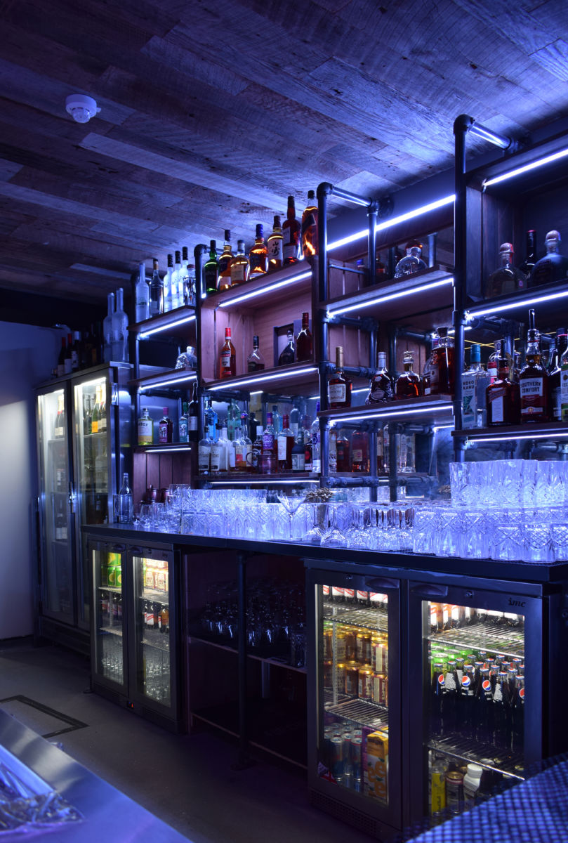 usain bolt Tracks & Records bar restaurant counter manufactured and installed by Aspen Concepts Ltd