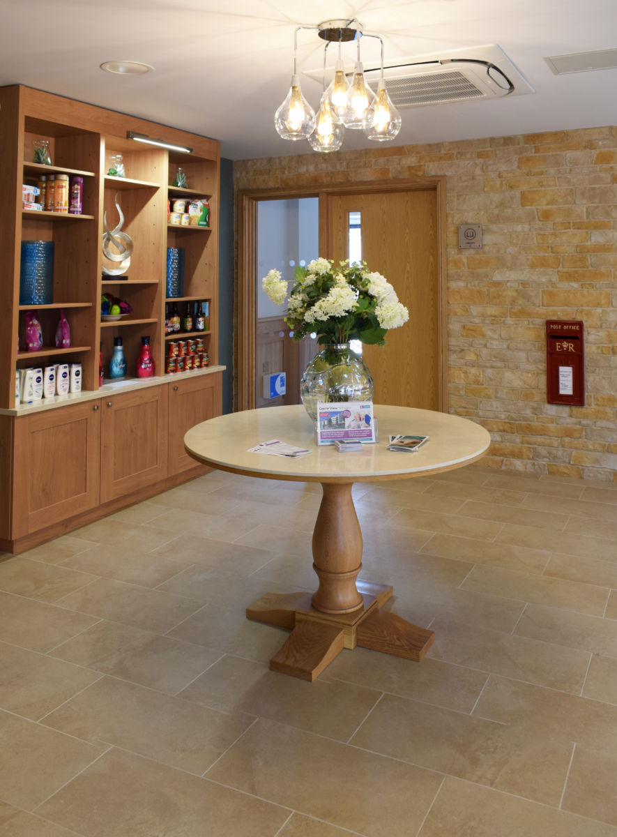 bespoke table and shelves for retirement home reception Windsor castle view